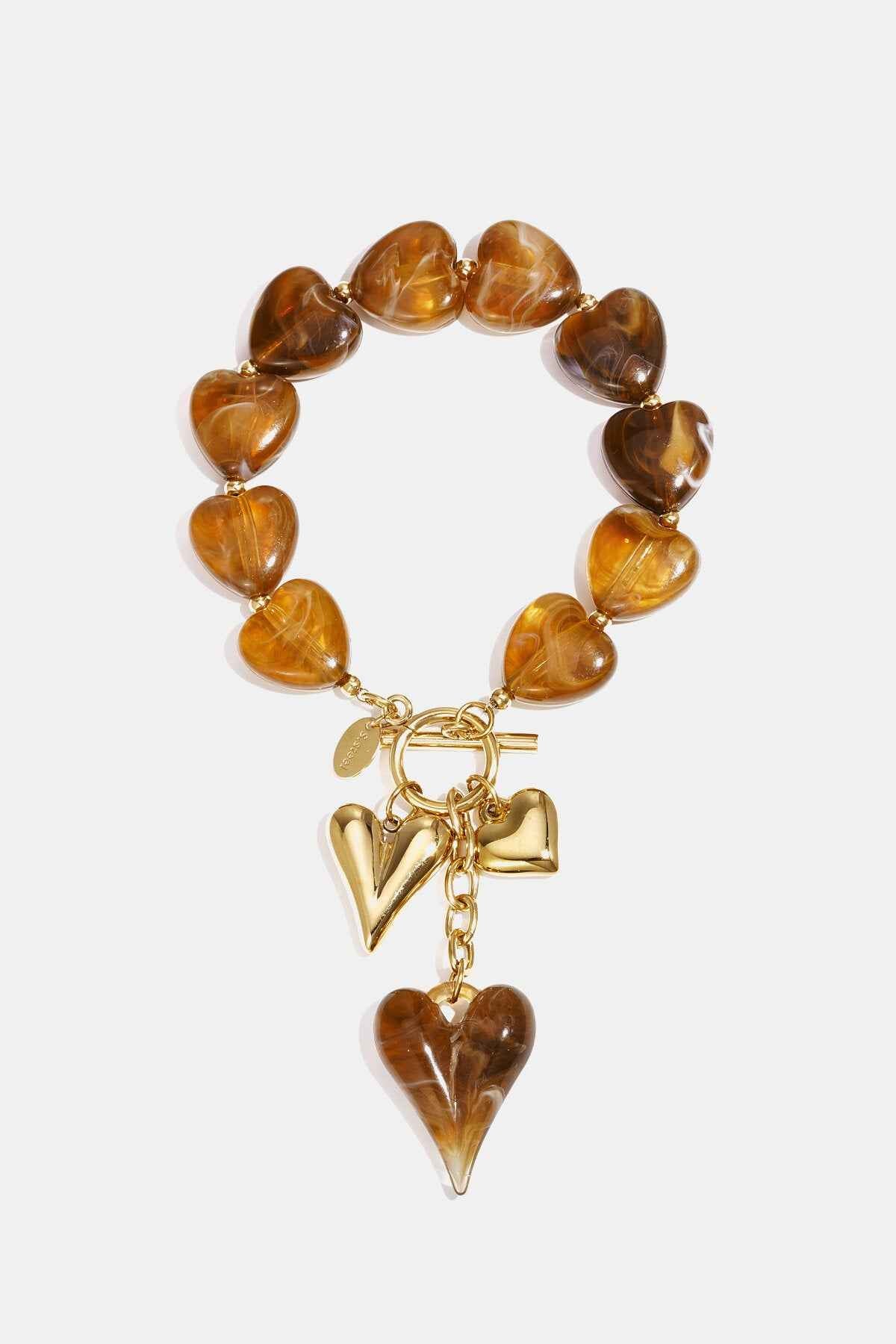 Kralenarmband met hangende harten charms