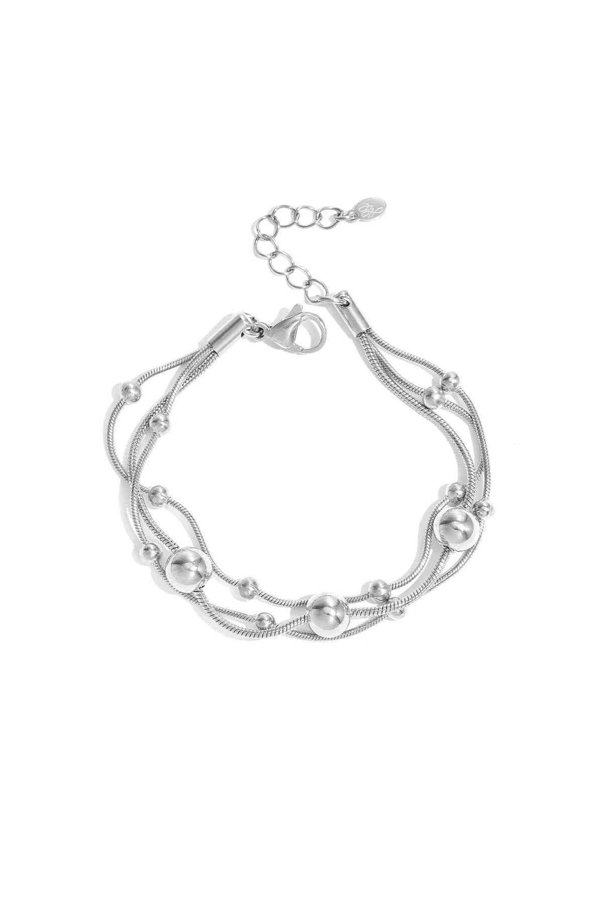 Armband met kettingen en polkadots