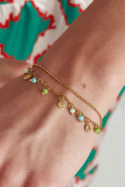 Armband met muntjes en kralen - roze/Goud kleur