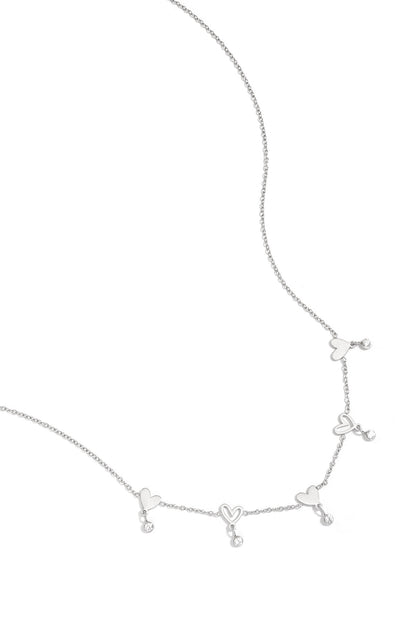 Ketting met wisselende hartjes en hangende steentjes