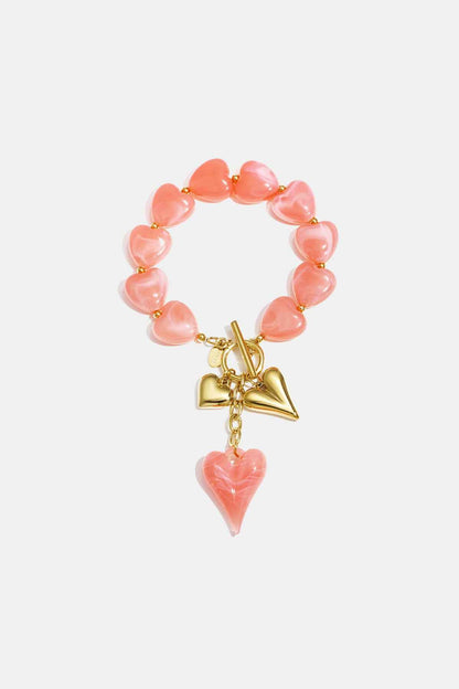 Kralenarmband met hangende harten charms