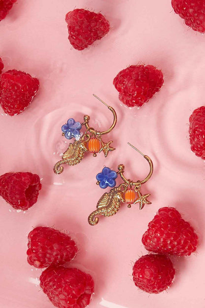 Oorringen met zeepaardje en charms