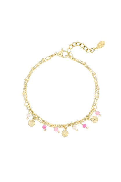 Armband met muntjes en kralen - roze/Goud kleur