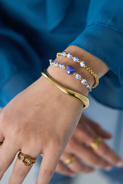 Massieve kralenarmband met kralen in blauwe floral print