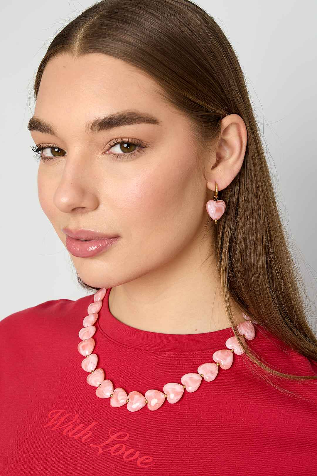 Earrings with heart-shaped beads