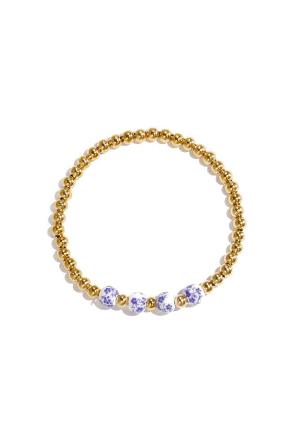 Massieve kralenarmband met kralen in blauwe floral print