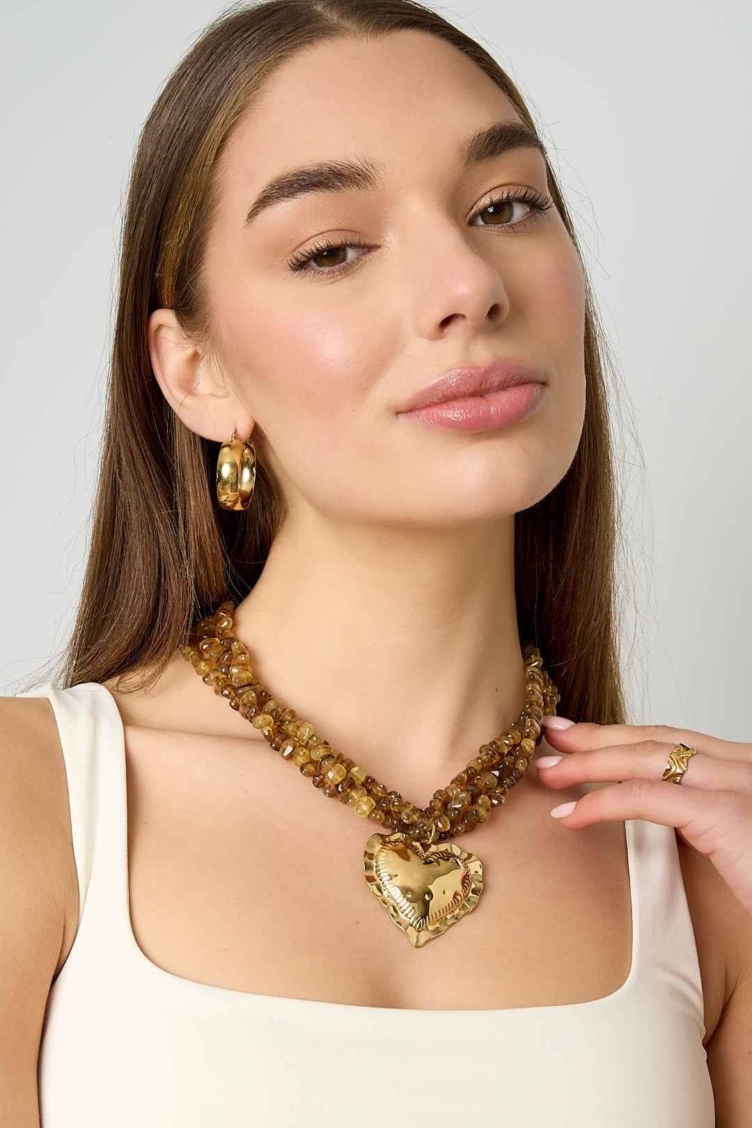 Linked bead necklaces with hanging heart
