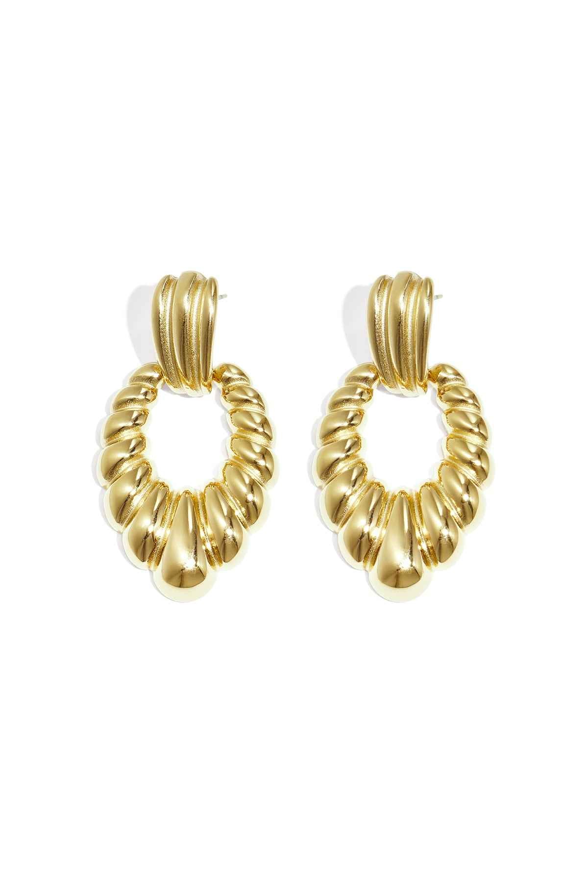 Statement oorbellen schelpmotief