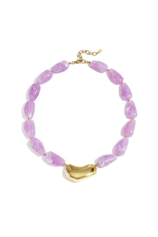 Necklace with asymmetric statement bead