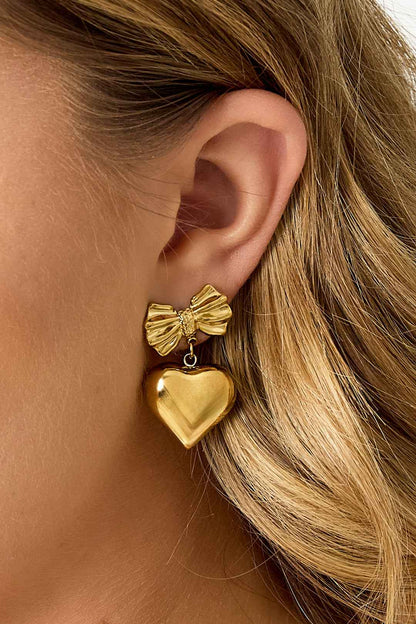 Bow earrings with hanging heart