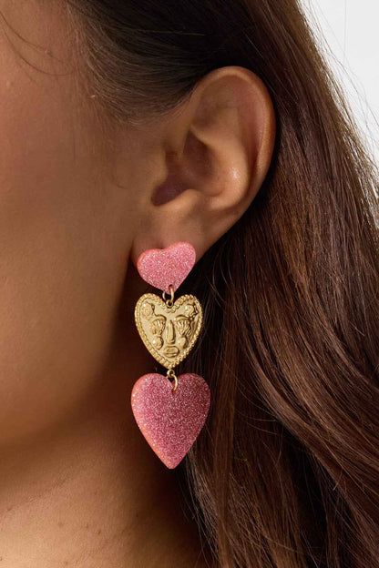 Statement oorbellen met glitter harten