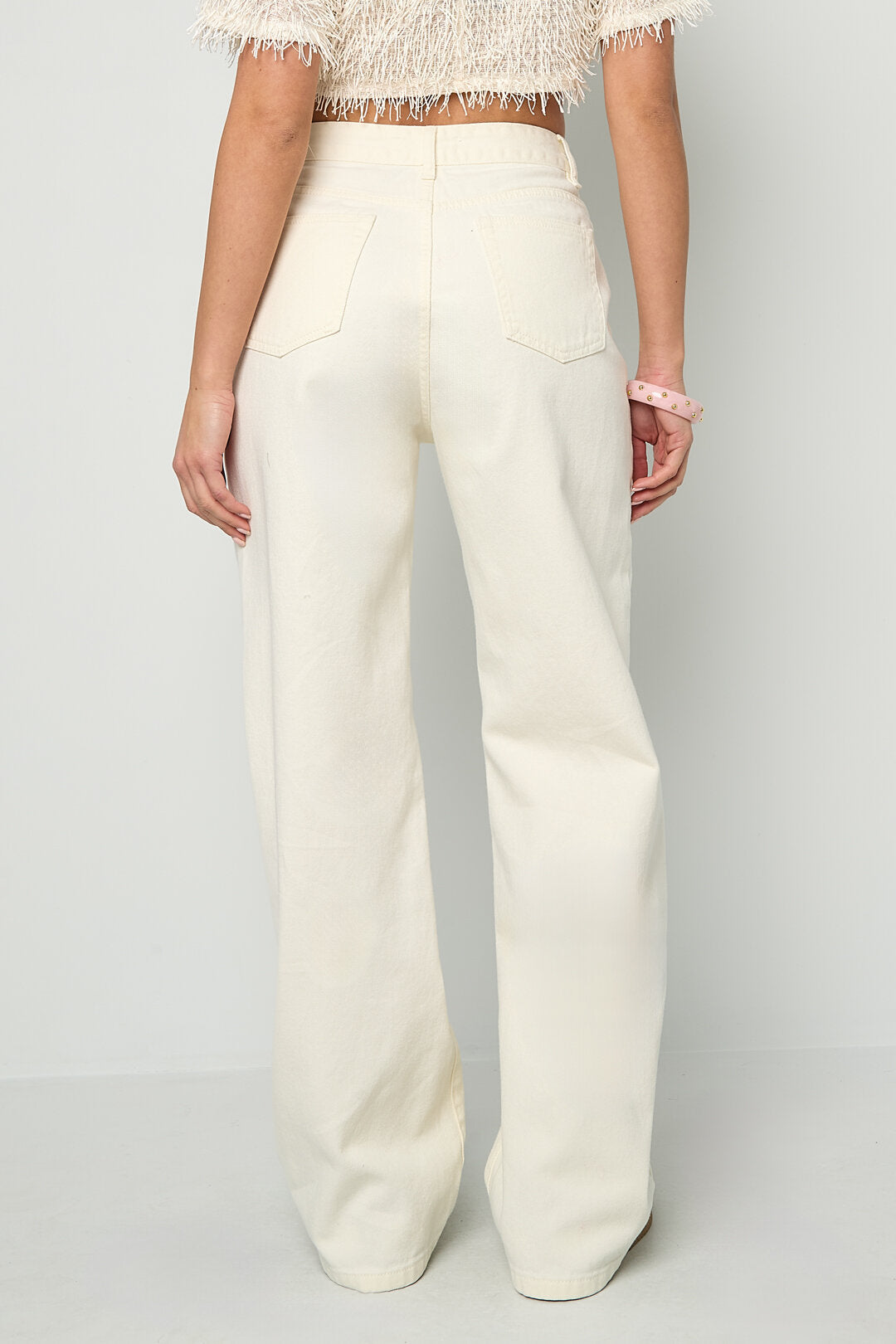 Jeans met vetersluiting