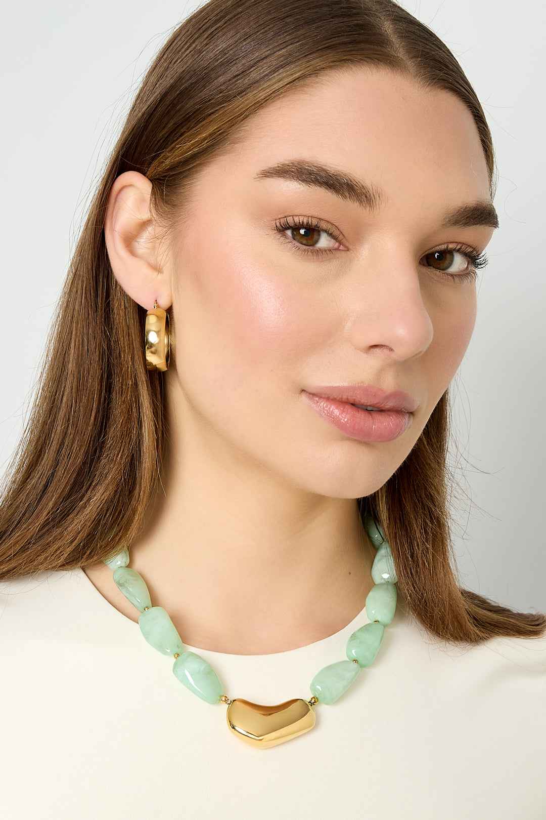 Necklace with asymmetric statement bead