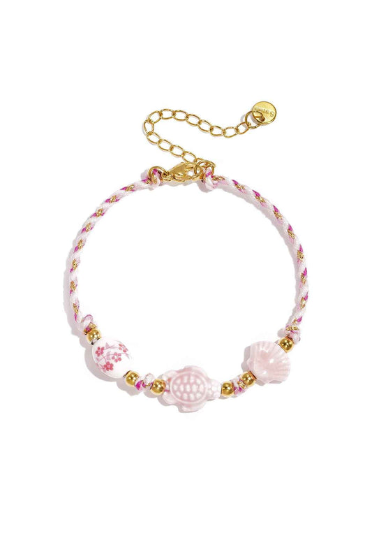 Armband met schildpad en schelp kralen en touwmotief