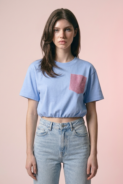 Crop ballon top lichtblauw met roze glitter zakje
