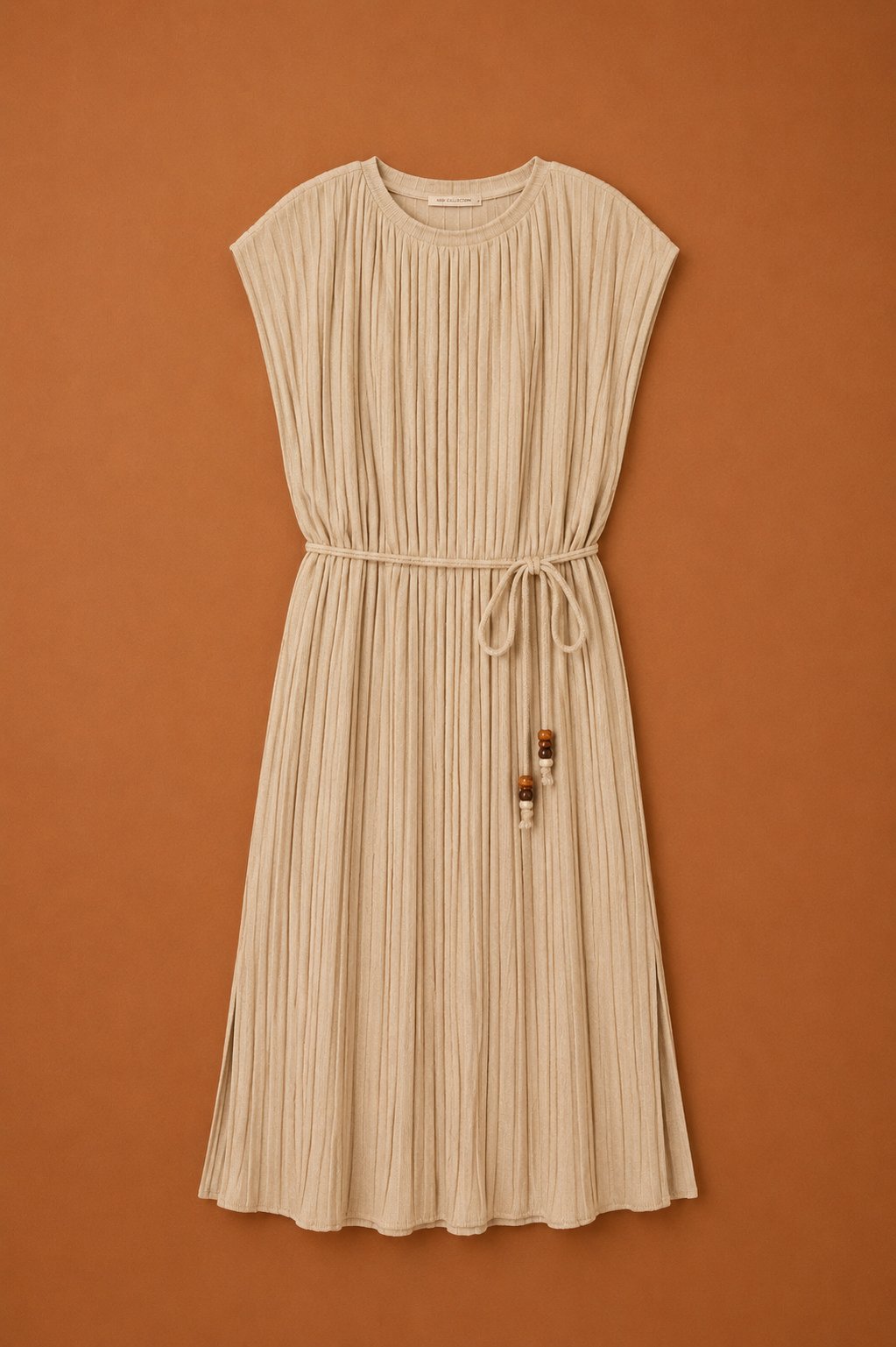 Beige plissé jurk met strikceintuur
Stijlvolle oversized damesjurk
