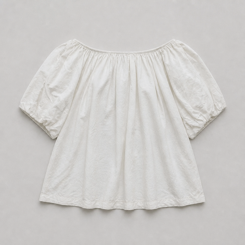 Luchtige top met ronde onderkant Beige