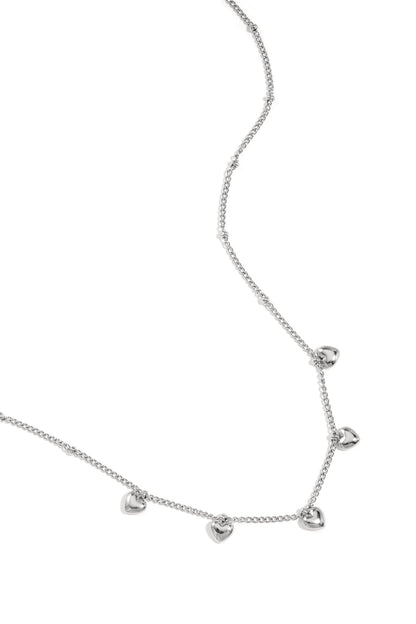 Minimalistische ketting met kleine hartjes