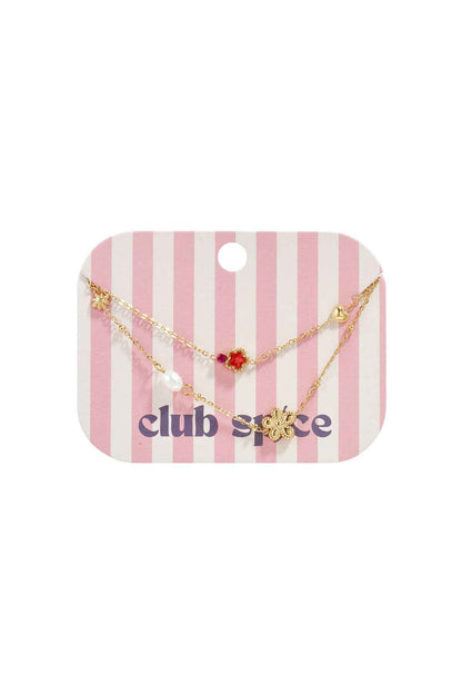 Bedelarmband met ster en bloemcharms, parels, steentjes en kraaltjes