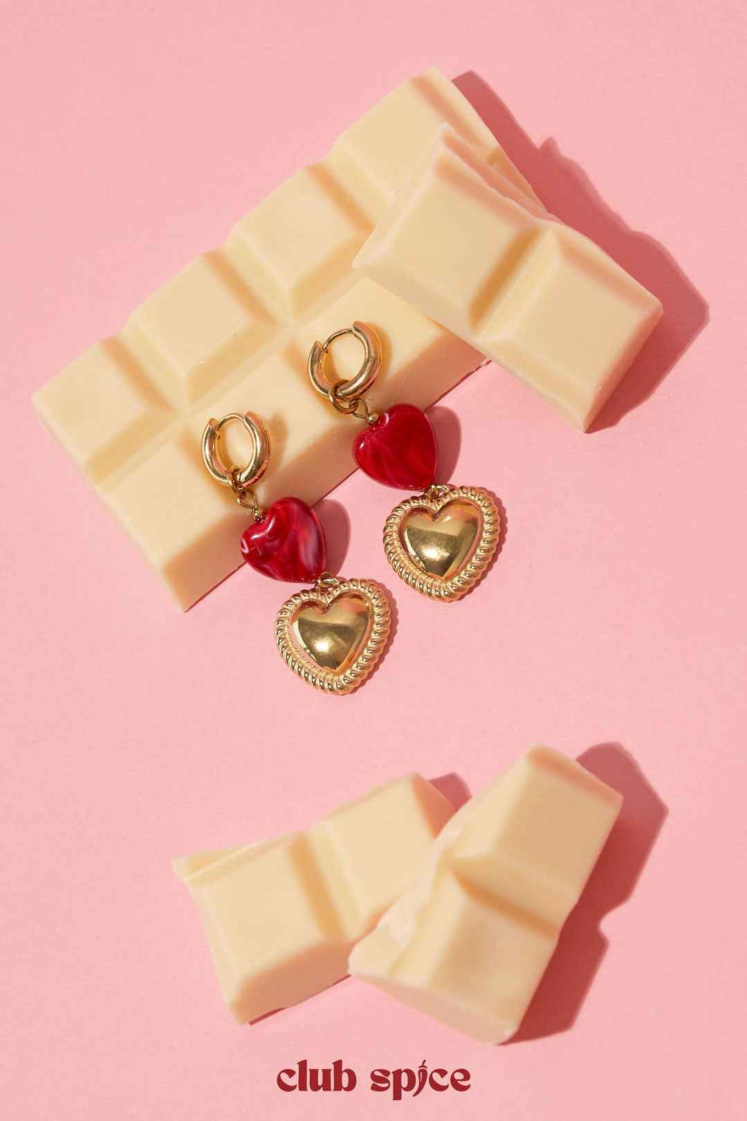 Heart-shaped pendant earrings