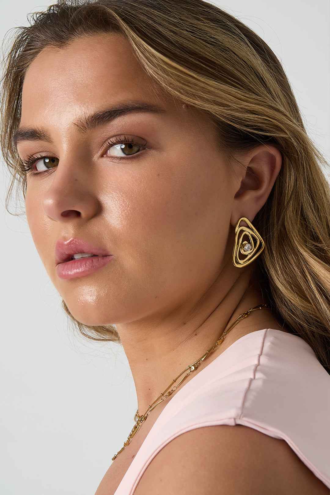 Hypnosis earrings with stone