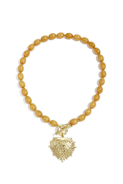 Bead necklace with front closure charm