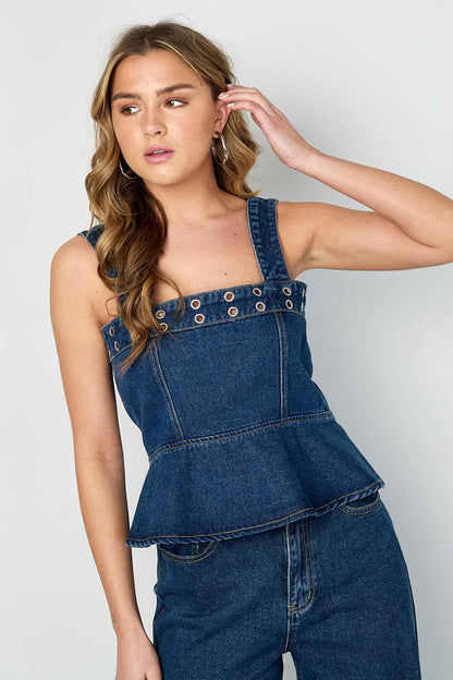Opvallende denim top met oogjes