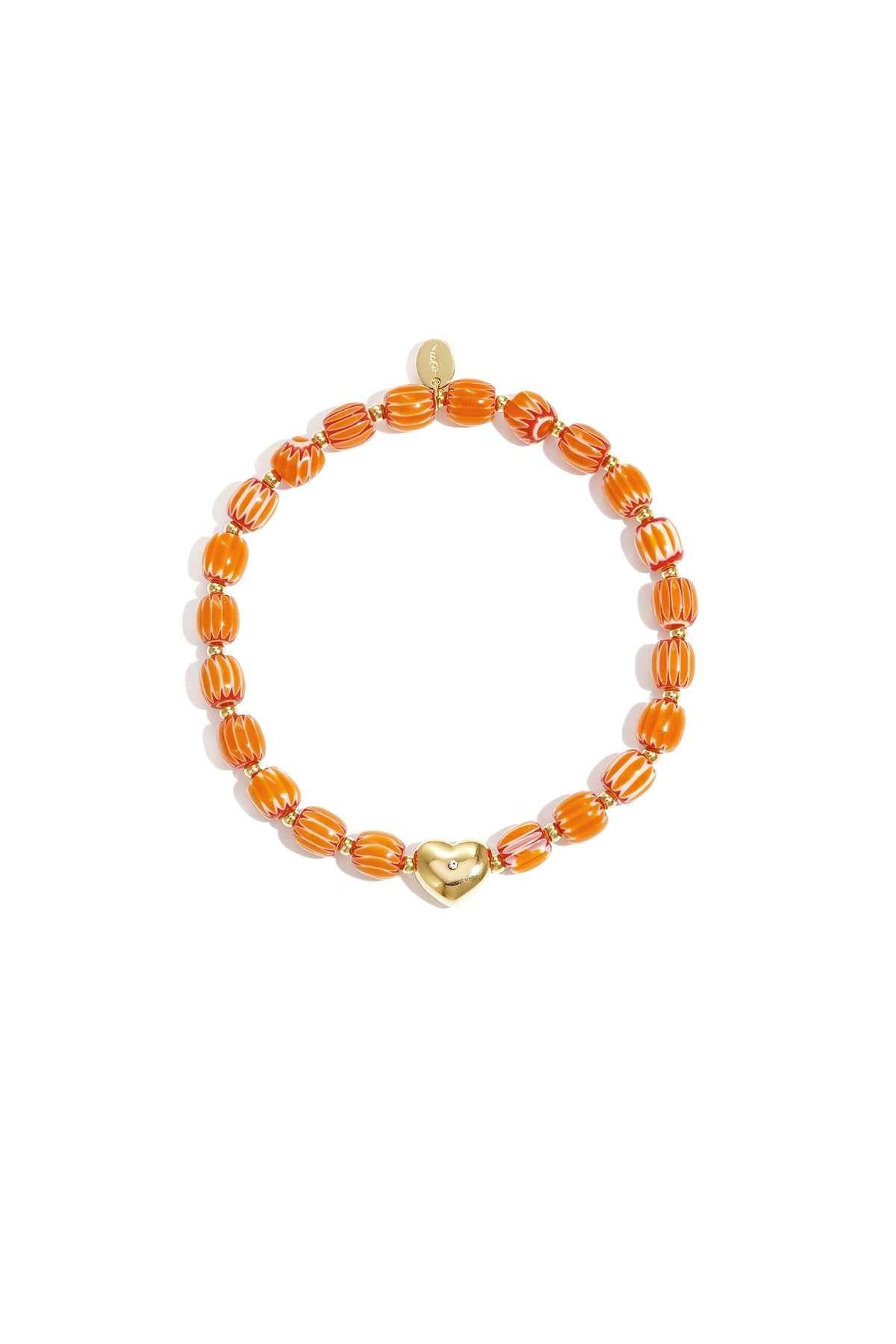 Beaded bracelet with heart-shaped centerpiece