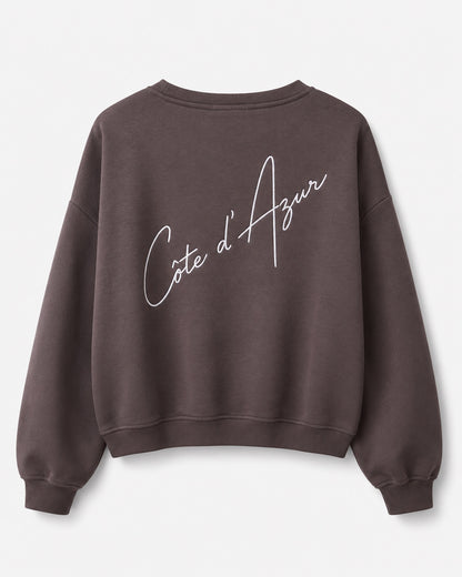 MOOIJ Sweater Celine Côte d'Azur chocobruin achterkant met grote geborduurde tekst