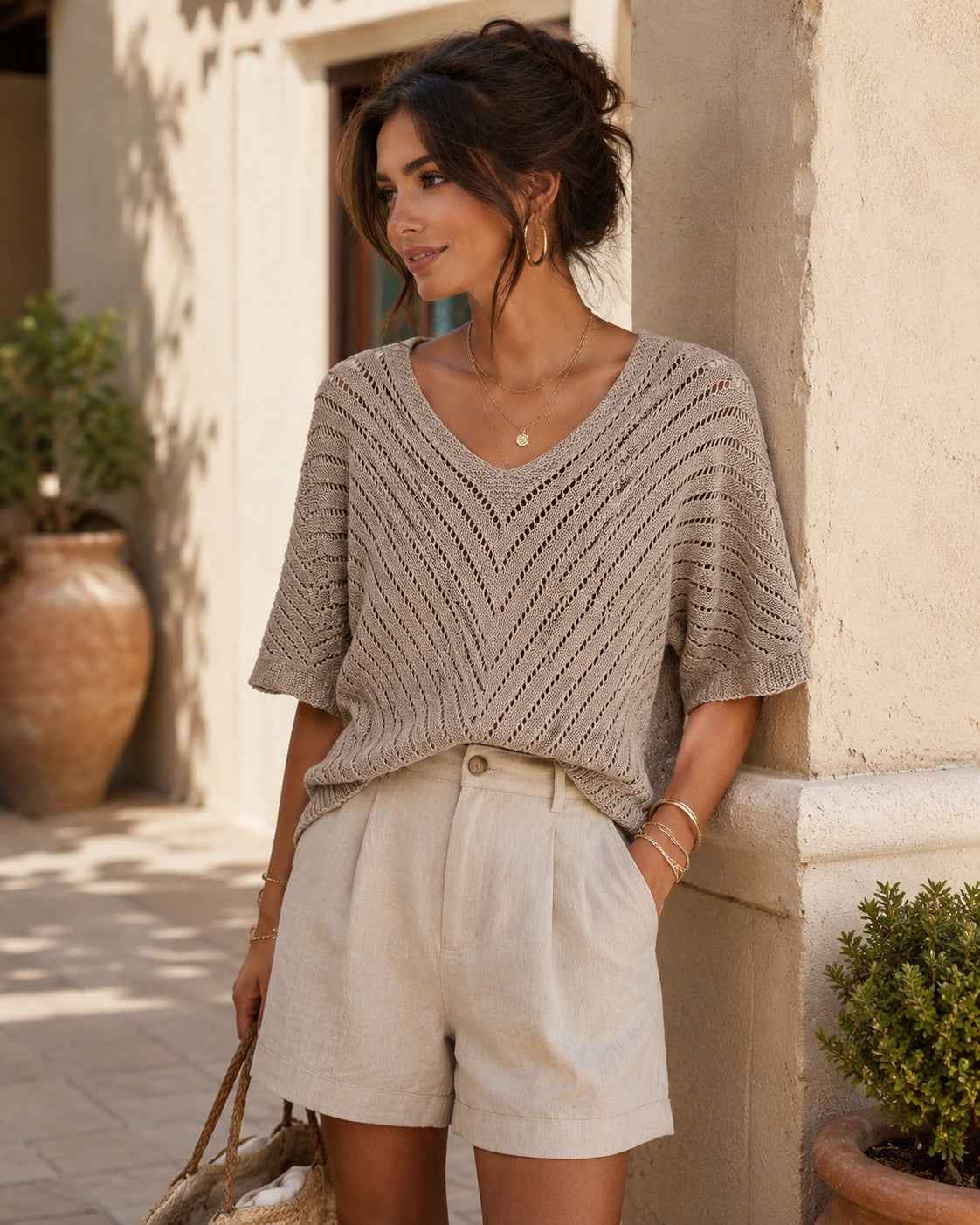 Trui Nova Reliëf beige korte mouw gebreide trui met V-hals